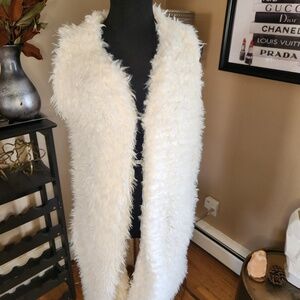 White faux furry vest